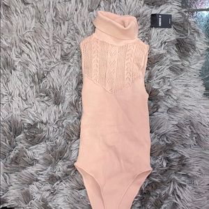 Light pink turtle neck bodysuit